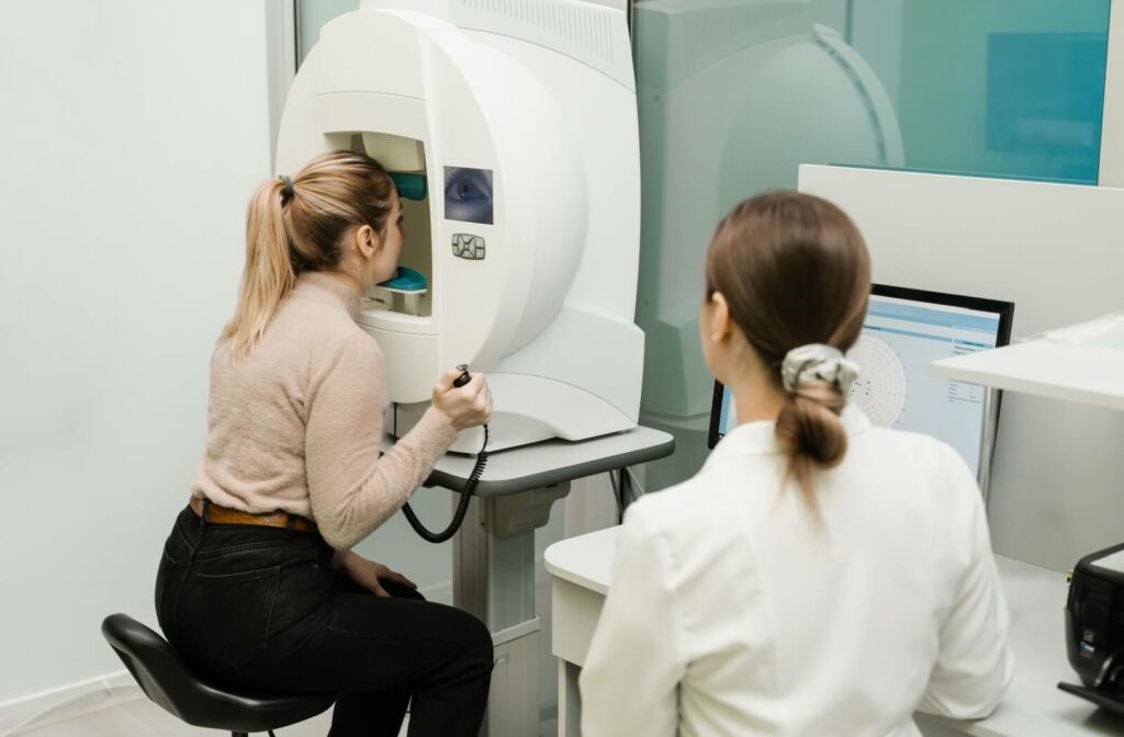 A patient undergoes glaucoma testing during their routine eye exam.